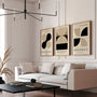 black and beige geometric bauhaus poster set in minimalist office