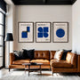navy bauhaus poster set arranged in refined modern gallery wall