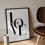 detail of elegant LOVE typography on minimalist wall art