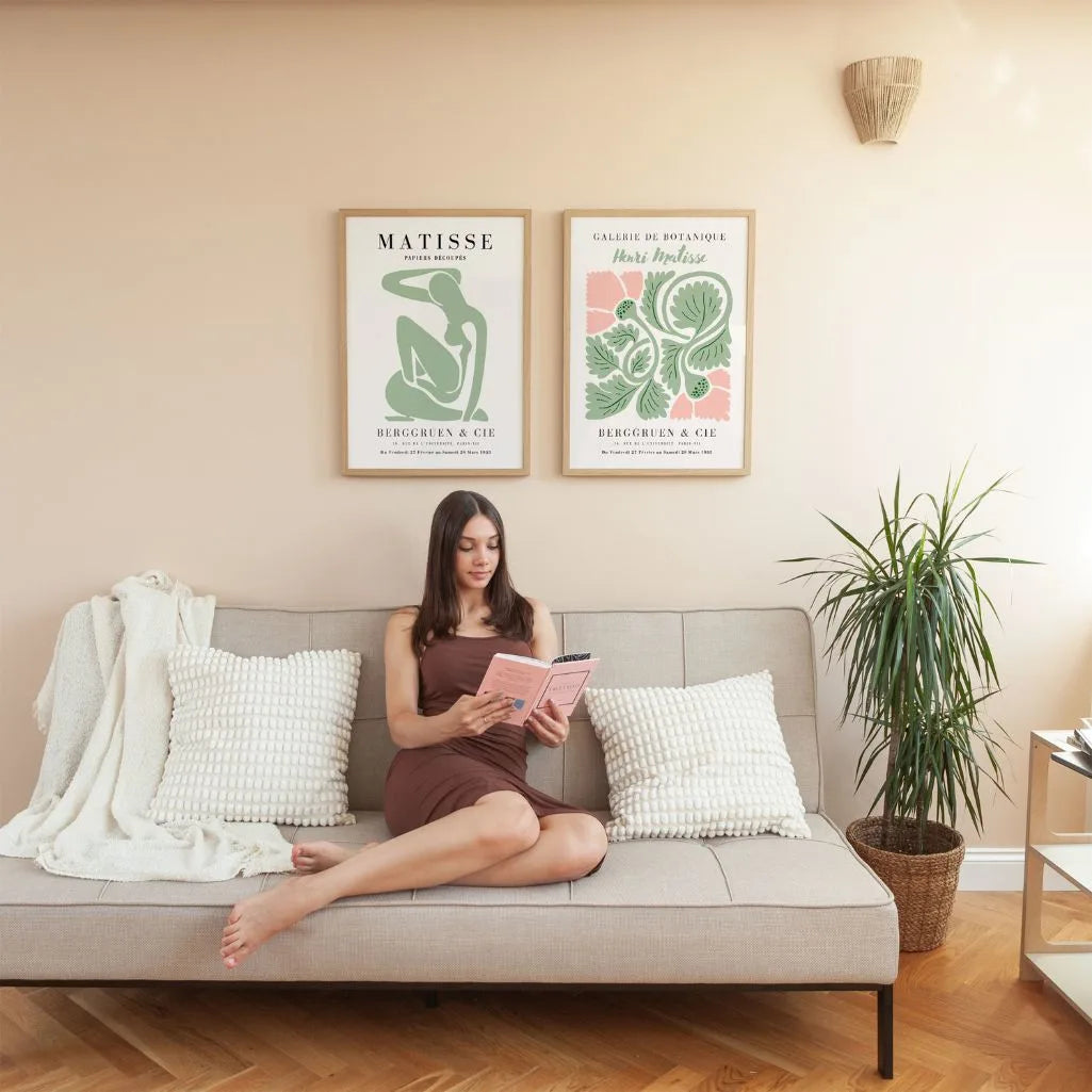Close up of botanical green poster set showing organic shapes and soft blush tones