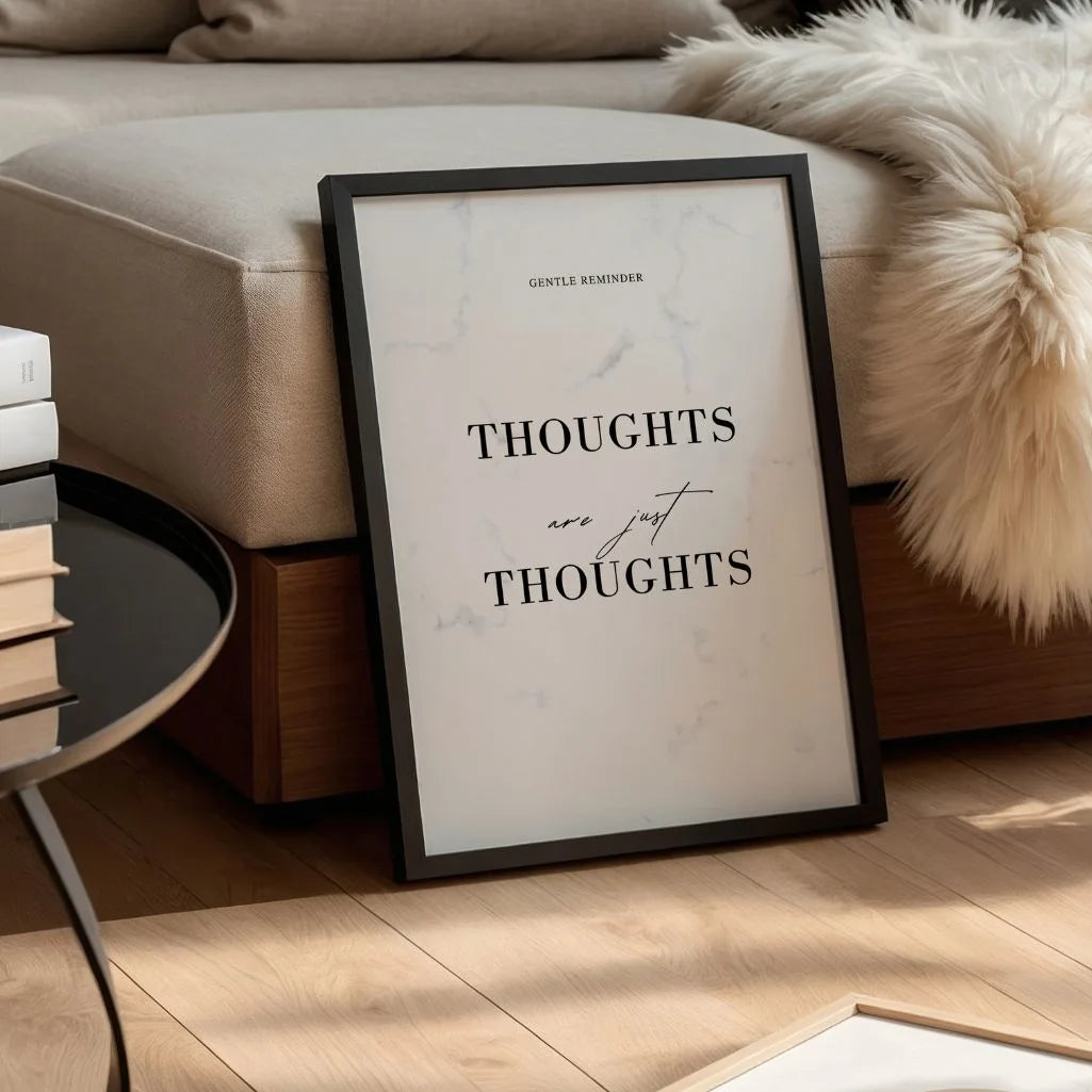 minimalist marble quote poster in calm bedroom interior